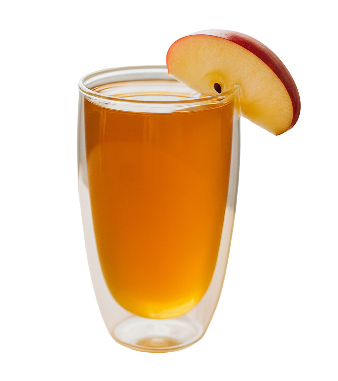 Glass of yaupon and apple on a white background